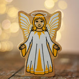 Lanka Kade Christmas angel toy with yellow and white dress, wings and halo.