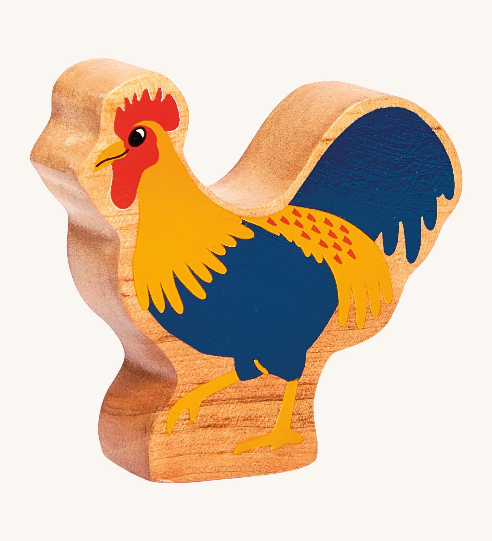 Lanka Kade blue cockerel wooden figure available at Babipur. A chunky wooden figure in a shape of a cockerel.