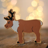 Lanka Kade Christmas reindeer toy, a wooden figure printed on both sides.