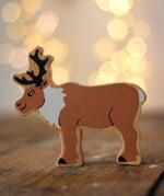 Lanka Kade Christmas reindeer toy, a wooden figure printed on both sides.