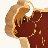 Lanka Kade wooden brown highland cow figure showing close up of painted facial features