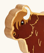 Lanka Kade wooden brown highland cow figure showing close up of painted facial features