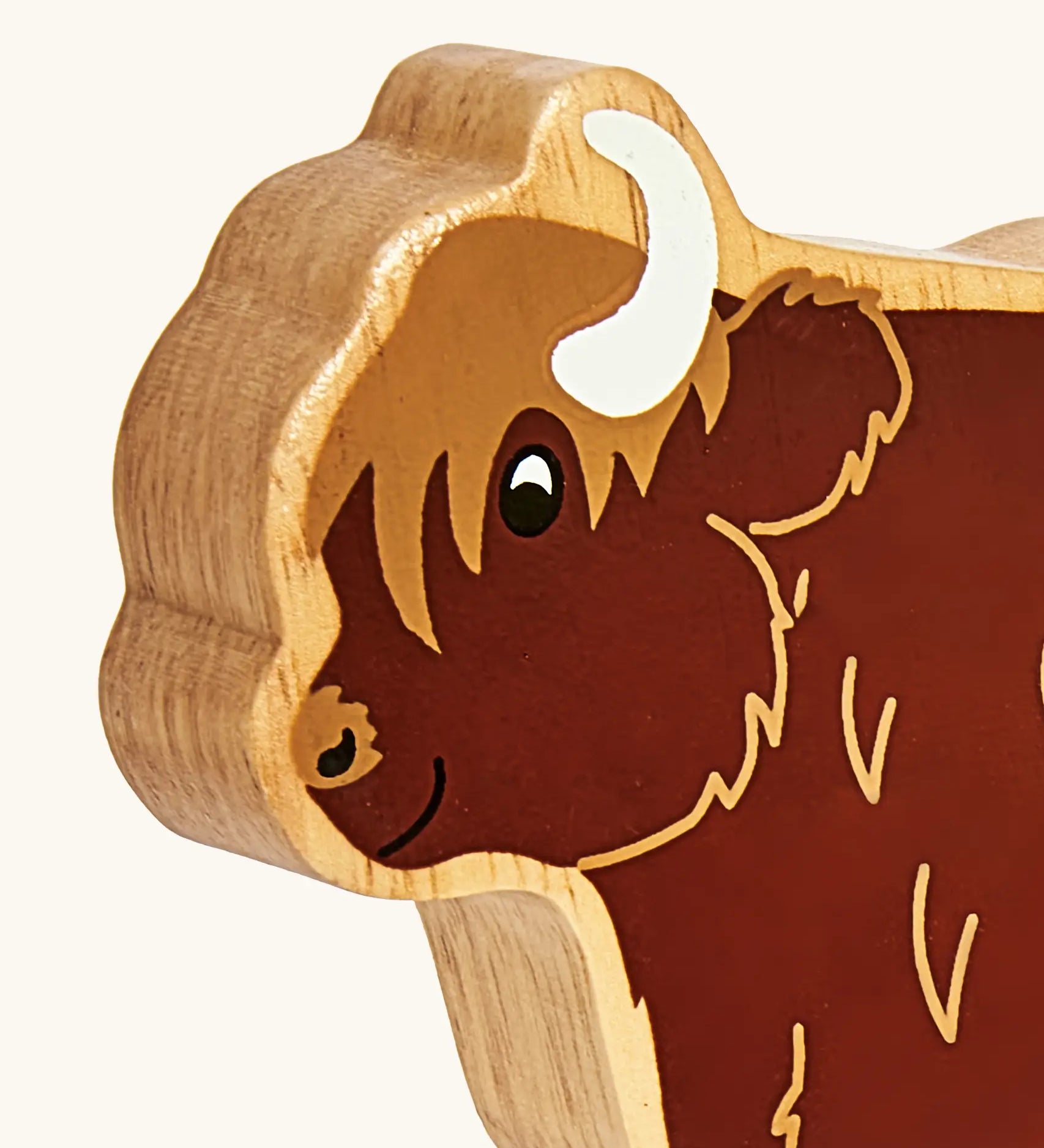 Lanka Kade wooden brown highland cow figure showing close up of painted facial features