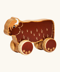 Lanka Kade highland cow wooden push along toy with wheels