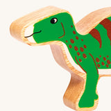 A close up of the Lanka Kade Iguanodon figure available at Babipur. A chunky wooden figure in a shape of a Iguanodon. 