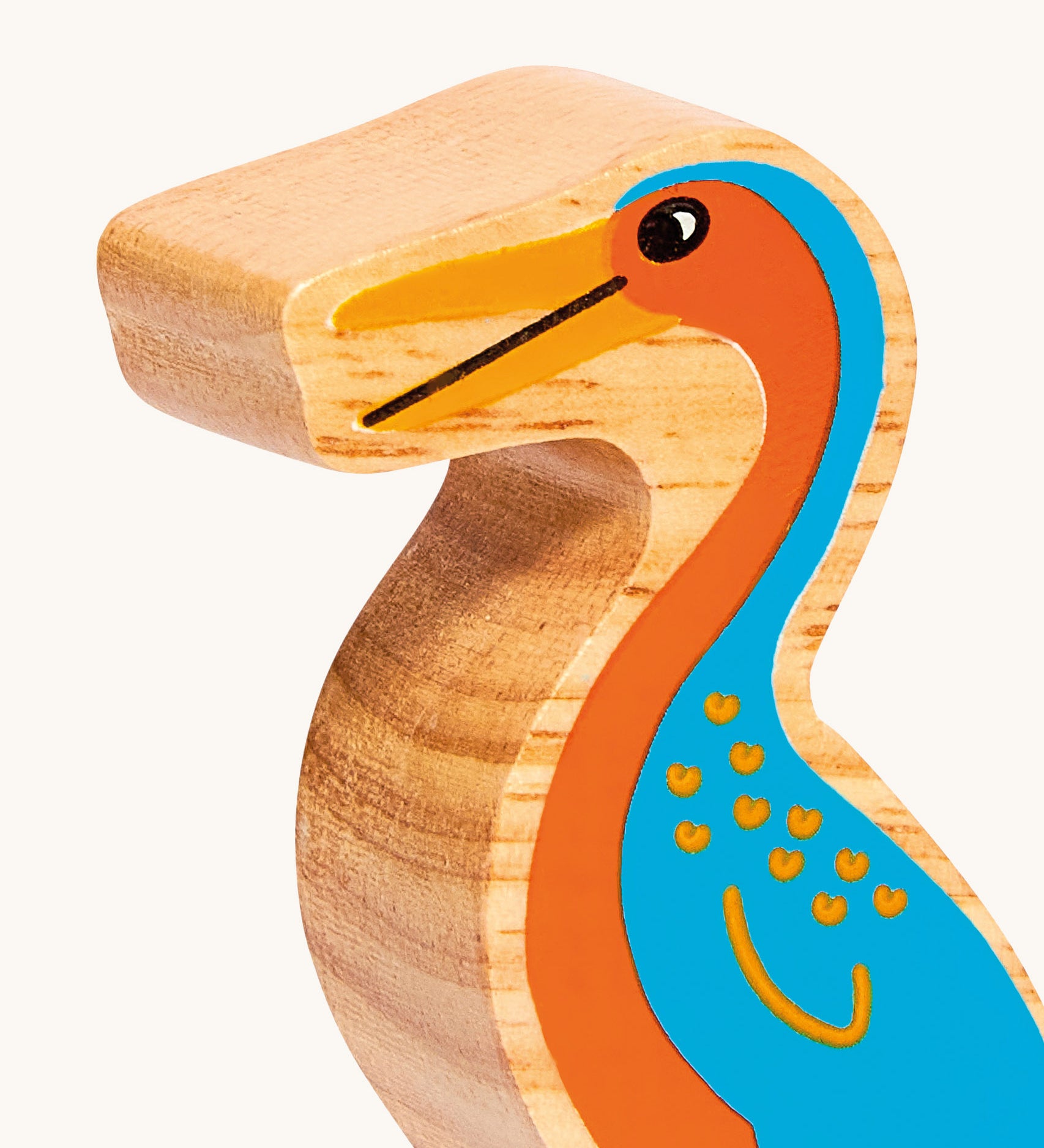 A close up of the chunky wooden Lanka Kade orange blue Hesperornis dinosaur figure available at Babipur.