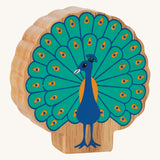 A chunky wooden Lanka Kade figure of a standing peacock and available at Babipur.