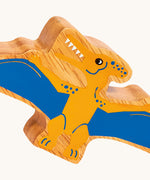 A close up of the chunky wooden Lanka Kade Pteradon dinosaur figure available at Babipur. 