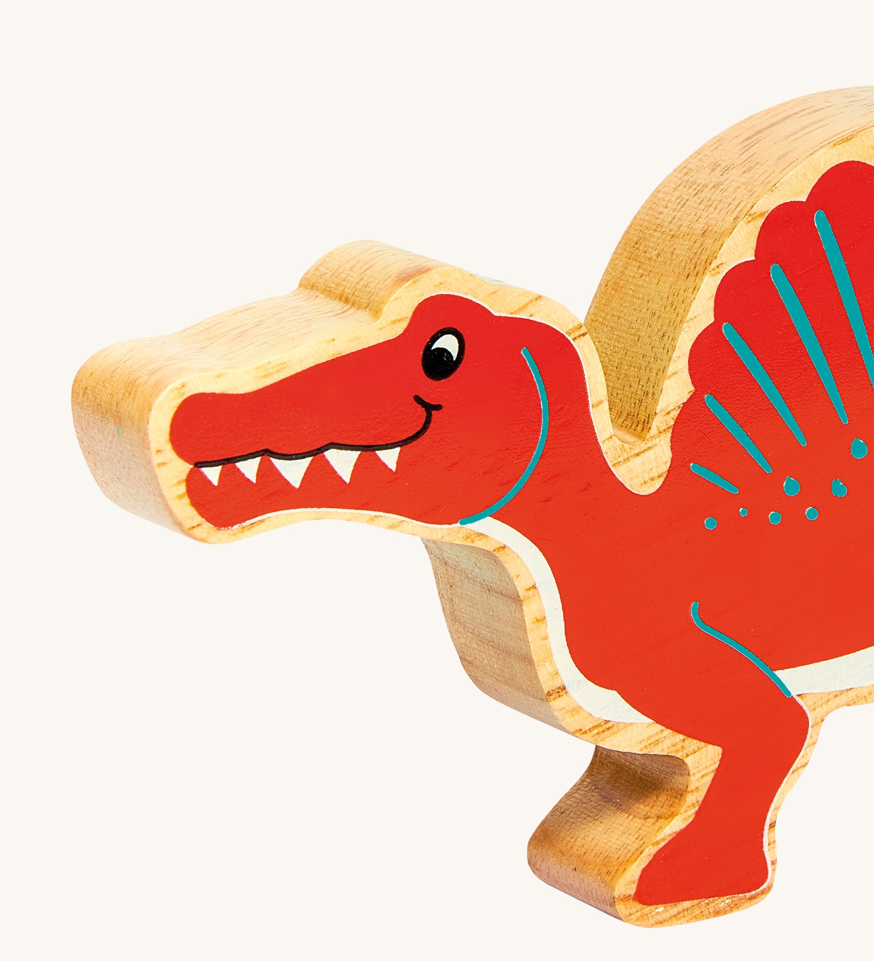 A close up of the chunky wooden Lanka Kade red Spinosaurus figure available at Babipur.