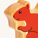 A close up of the chunky wooden Lanka Kade red squirrel animal figure available at Babipur. 
