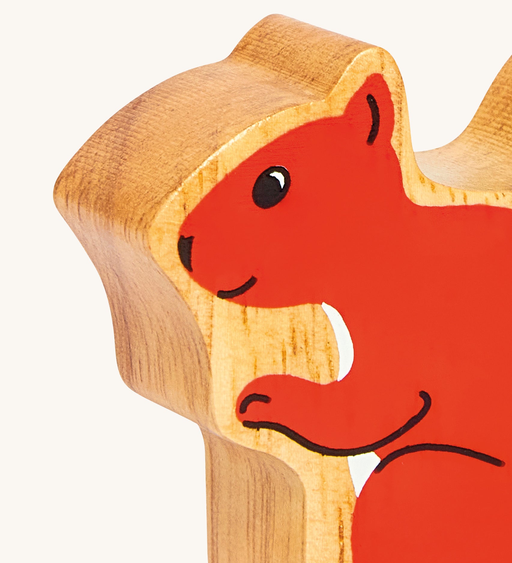 A close up of the chunky wooden Lanka Kade red squirrel animal figure available at Babipur. 