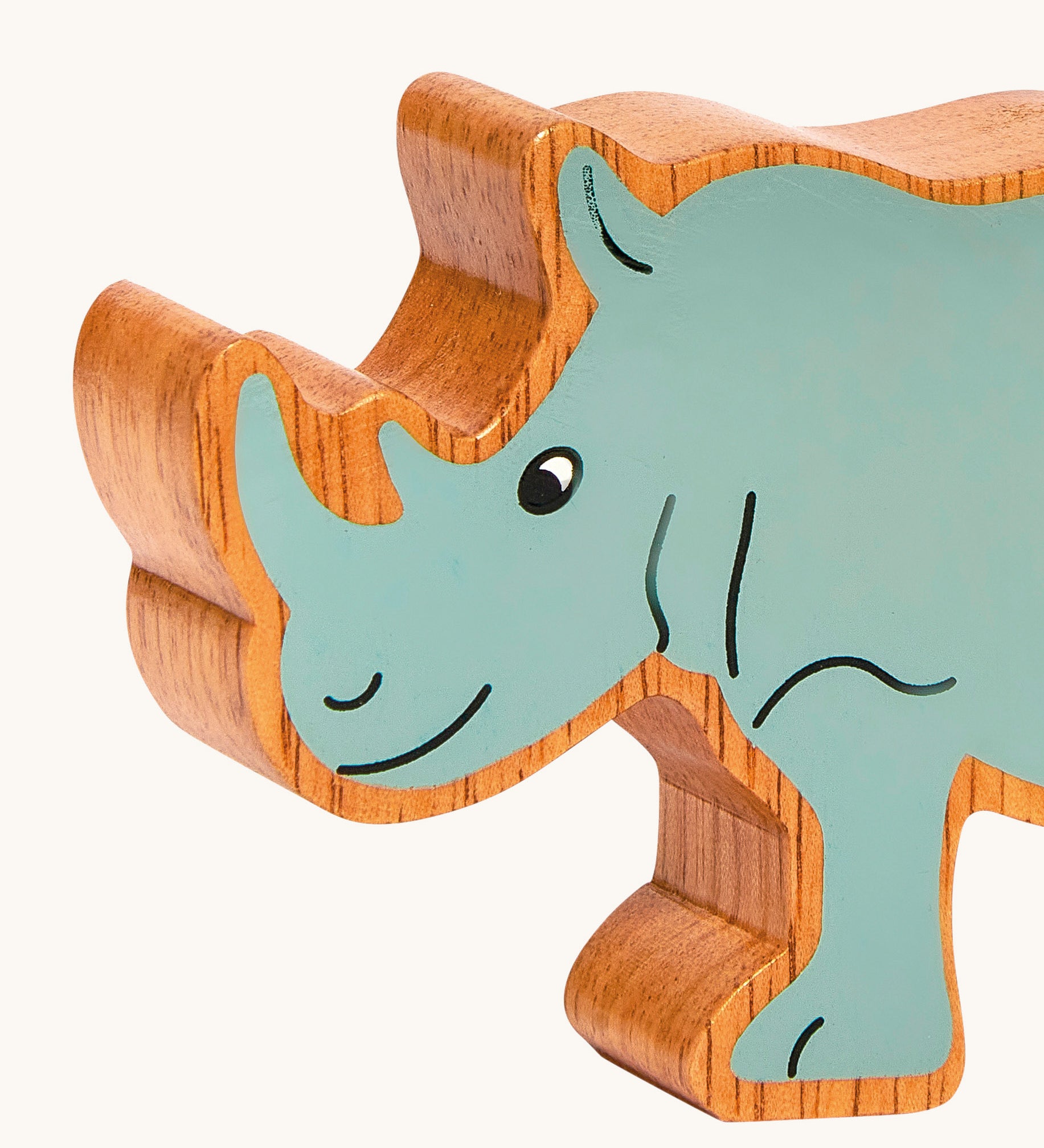 A close up of the chunky wooden Lanka Kade grey rhino figure available at Babipur.