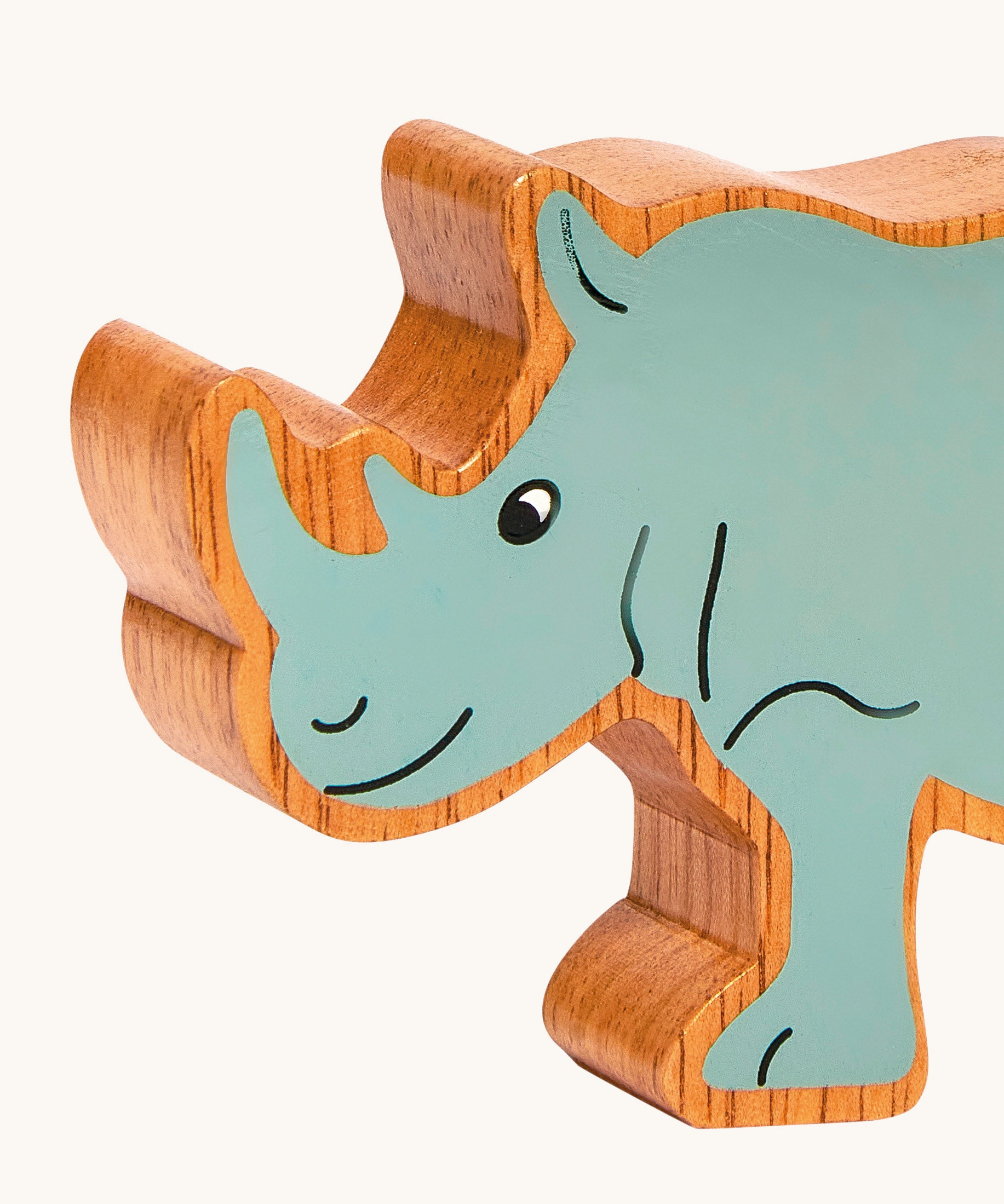 A close up of the chunky wooden Lanka Kade grey rhino figure available at Babipur.