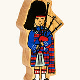 Lanka Kade wooden Scottish bagpiper figure toy wearing a traditional tartan outfit