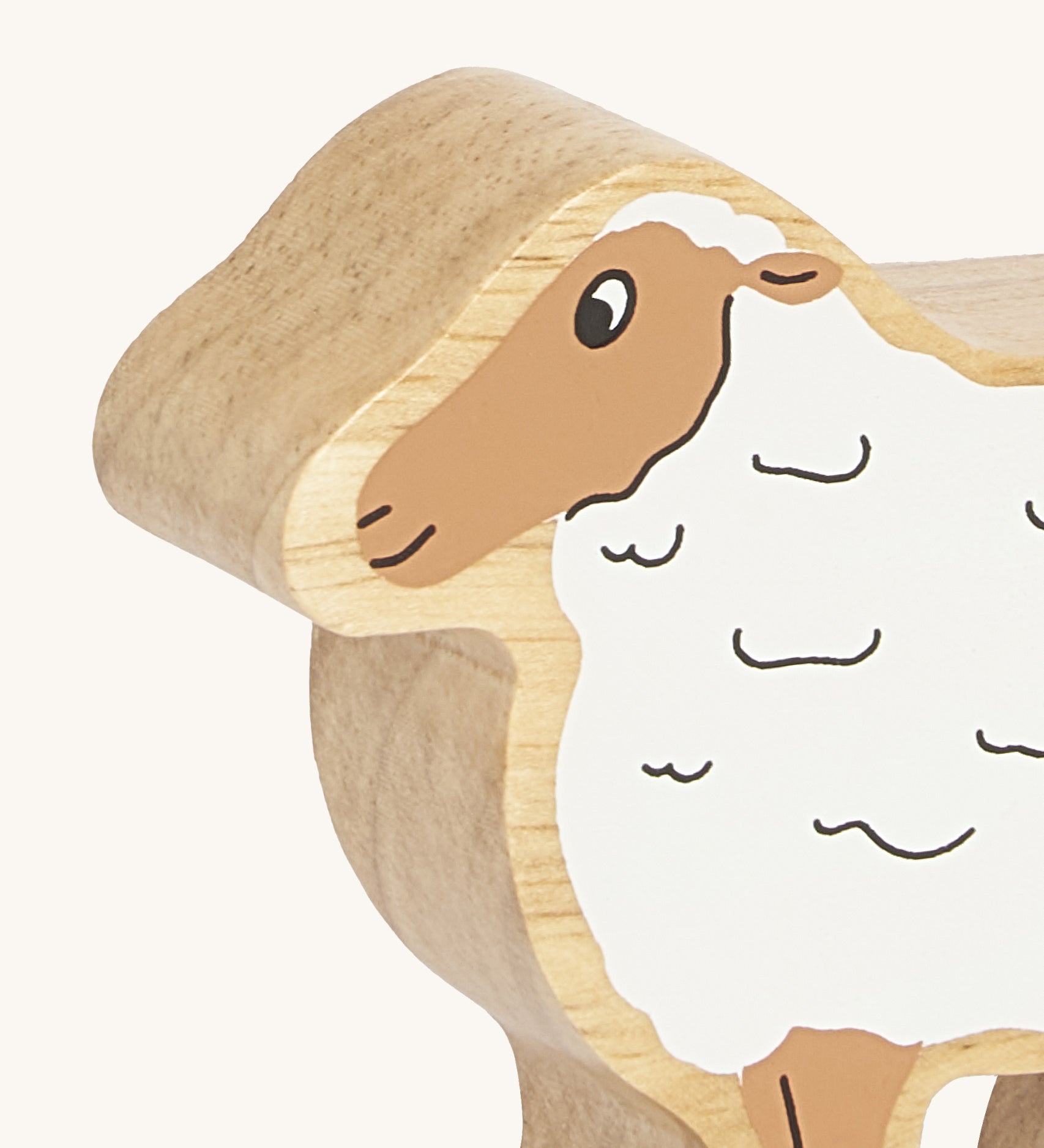 A close up of the chunky wooden Lanka Kade white sheep figure available at Babipur.