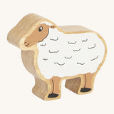A chunky wooden Lanka Kade white sheep figure available at Babipur.