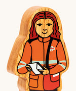 A close up of the chunky wooden Lanka Kade black and orange delivery woman figure available at Babipur.