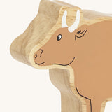 A close up of the chunky wooden Lanka Kade brown ox animal figure available at Babipur showing its facial features