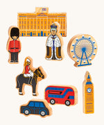 Lanka Kade London 8 piece play set available at Babipur. Chunky wooden figures inspired from people and attractions in London including Big Ben and Buckingham Palace