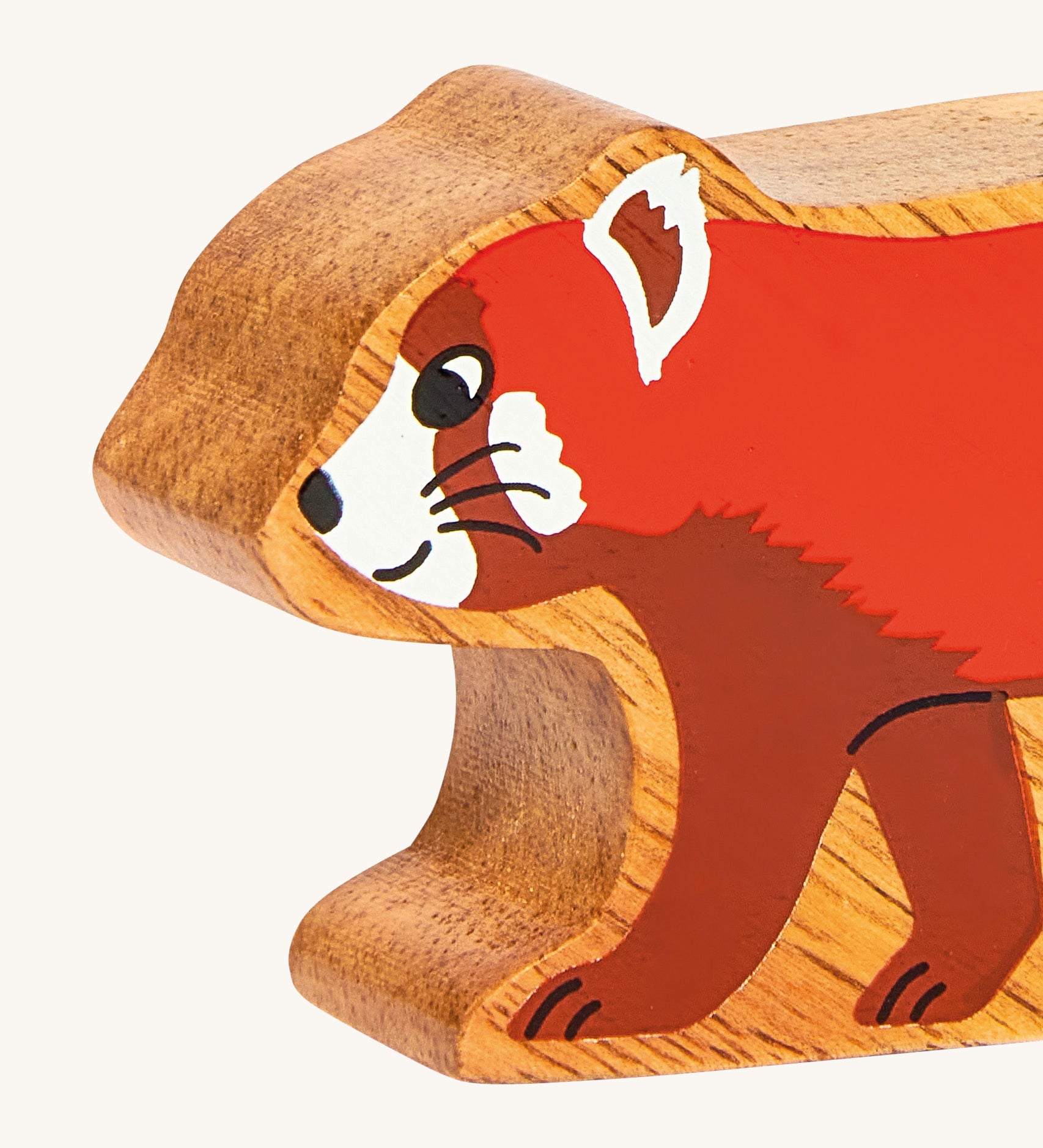 A close up of the chunky wooden Lanka Kade red panda animal figure available at Babipur.