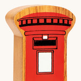 A close up of the chunky wooden Lanka Kade red post box figure available at Babipur.