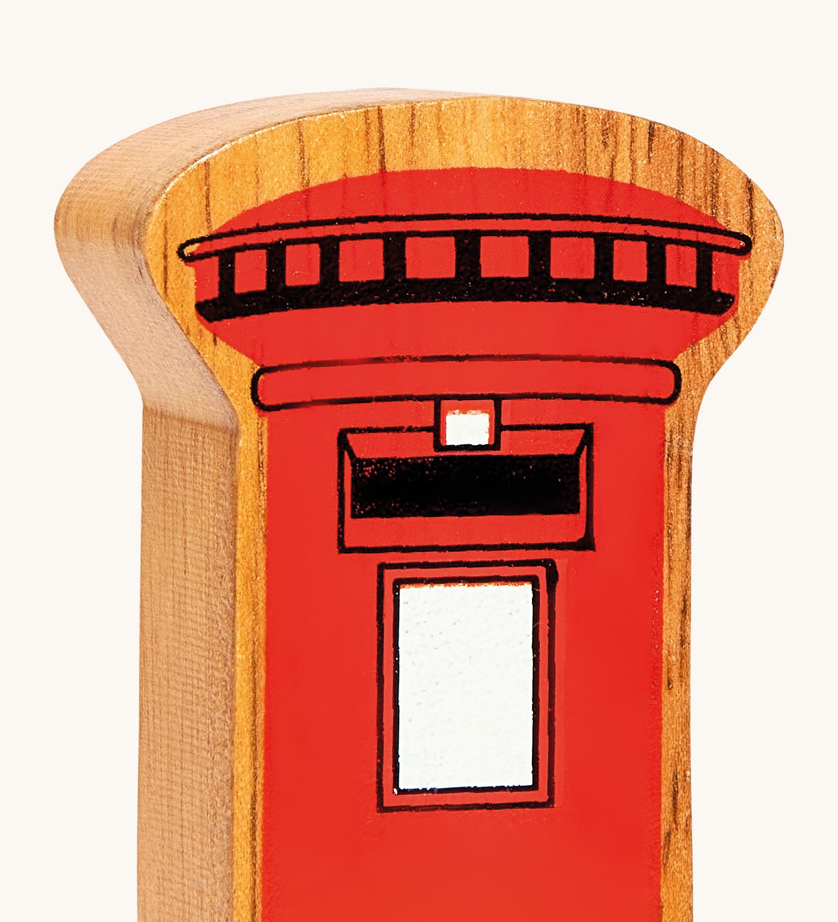 A close up of the chunky wooden Lanka Kade red post box figure available at Babipur.