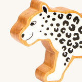 A close up of the chunky wooden Lanka Kade white snow leopard animal figure available at Babipur.