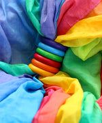 Laura's play cotton bright rainbow play cloth made from 100% organic cotton put through rainbow rings