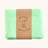Laura's 100% organic cotton play cloth in light green held together by a decorated cardboard strip