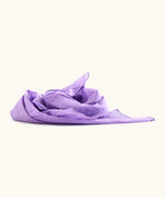 Violet purple 100% organic cotton play cloth ruffled up into a pile