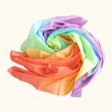 Laura's play cotton pastel rainbow play cloth made from 100% organic cotton ruffled up into a pile