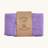 Laura's 100% organic cotton small play cloth in violet held together by a decorated cardboard strip