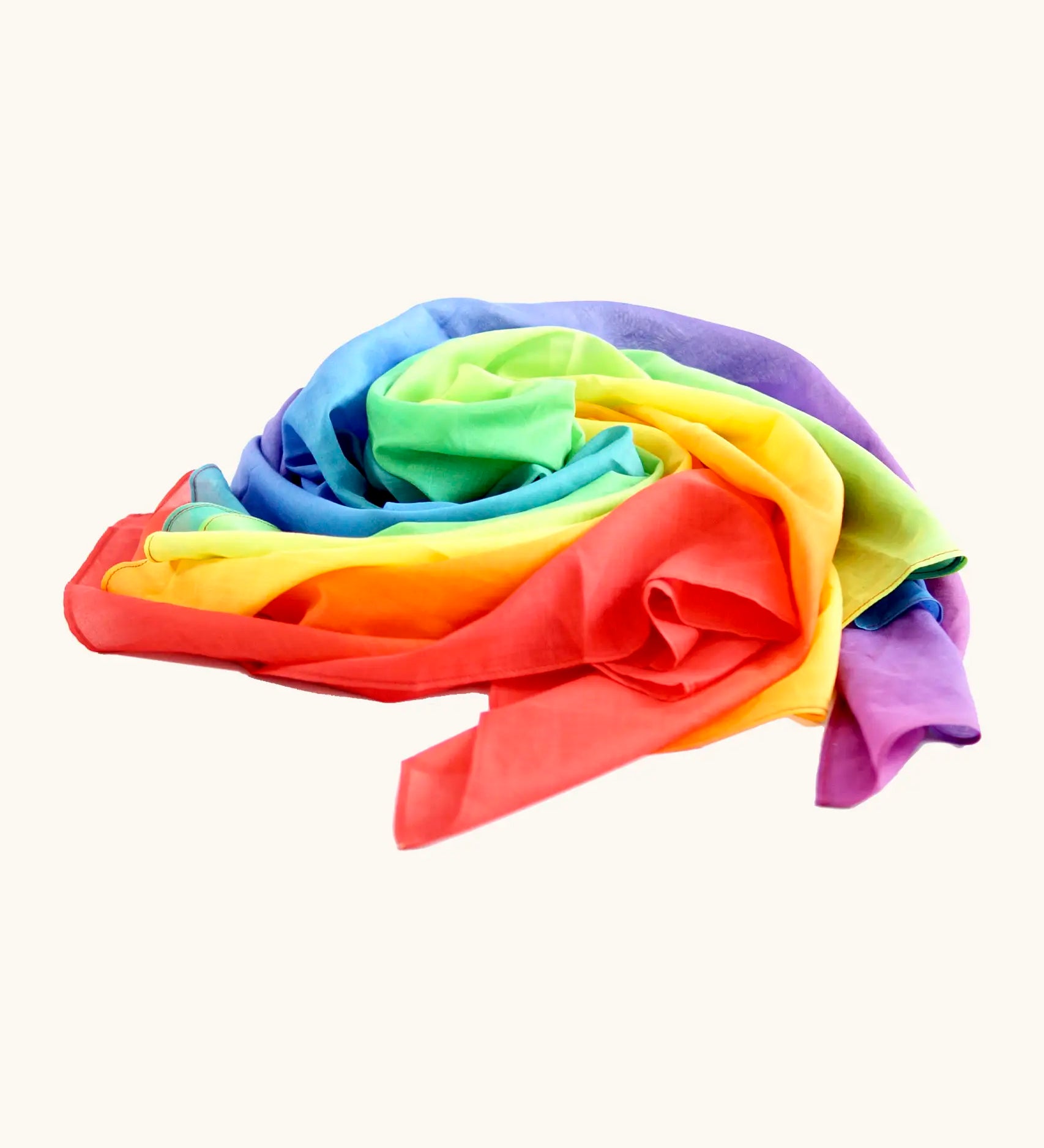 Laura's play cotton bright rainbow play cloth made from 100% organic cotton in  a pile