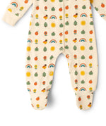 Feet on the Little Green Radicals vintage style cream rainbows organic cotton babygrow. Repeat print featuring nature themed illustrations.
