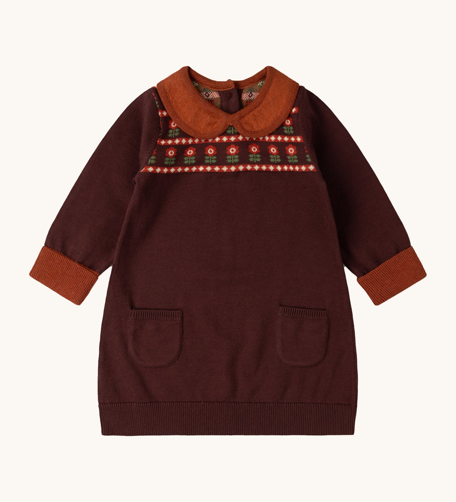 Little Green Radicals collecting flowers knitted collar dress available at Babipur. A dark maroon dress with a light brown collar and cuff trim. Features 2 side pockets and a cute retro flower design on the top