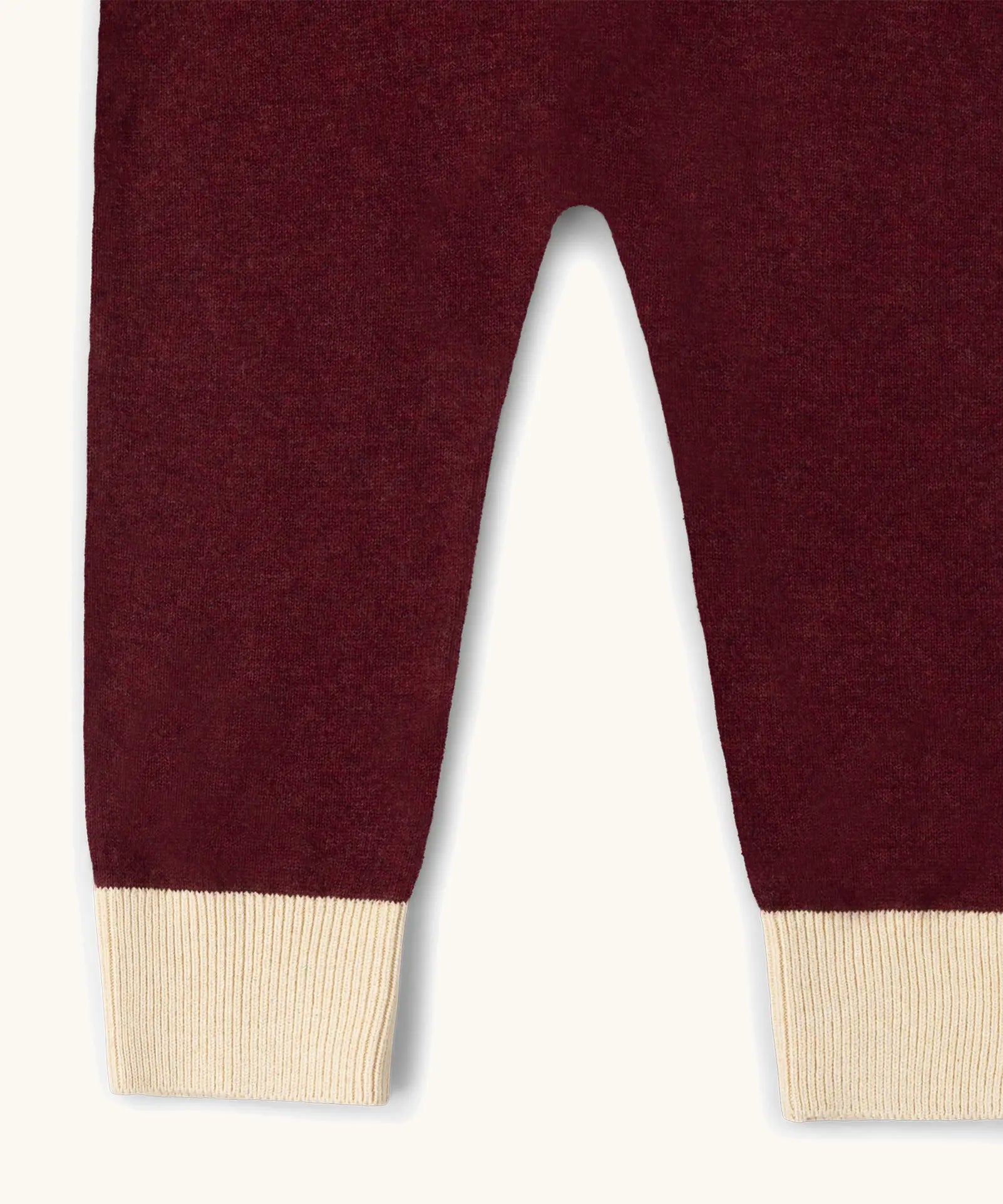 Little Green Radicals Organic Cotton Knitted Joggers in crimson Winter Berry with cream cuffs.
