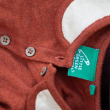 Close up of Little Green Radicals Long-Sleeve Knitted Collar Dress in Ginger Orange - showing wooden buttons, a cream Peter Pan collar with orange trim - made from soft Fairtrade GOTS organic cotton.