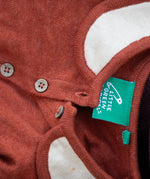 Close up of Little Green Radicals Long-Sleeve Knitted Collar Dress in Ginger Orange - showing wooden buttons, a cream Peter Pan collar with orange trim - made from soft Fairtrade GOTS organic cotton.