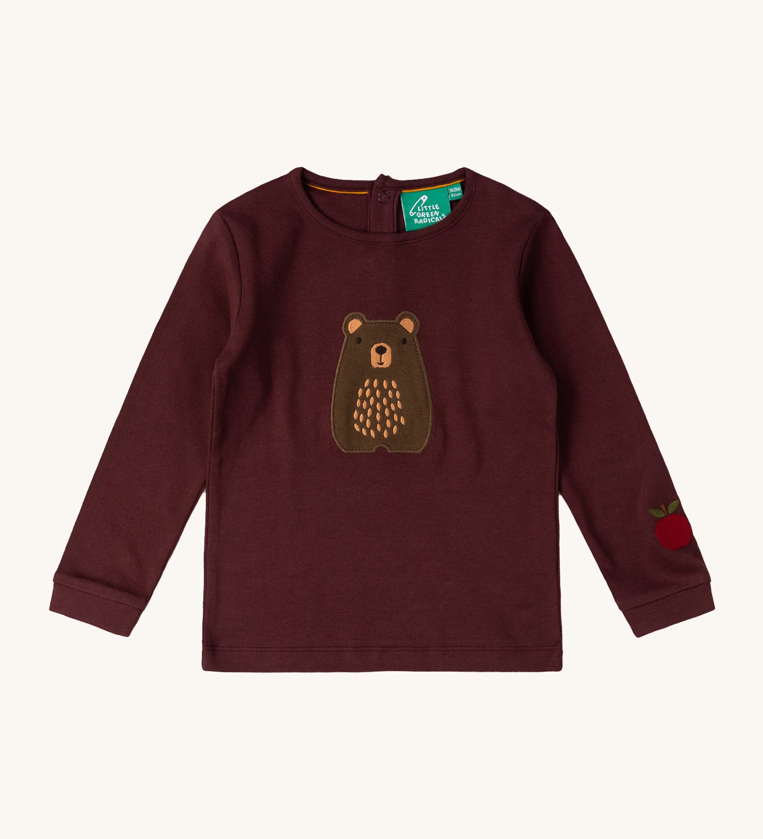 Little Green Radicals teddy bear applique long sleeve t shirt available at Babipur. A GOTS organic cotton long sleeve top in dark maroon with a cute brown bear appliqué on the front and apple on the arm 