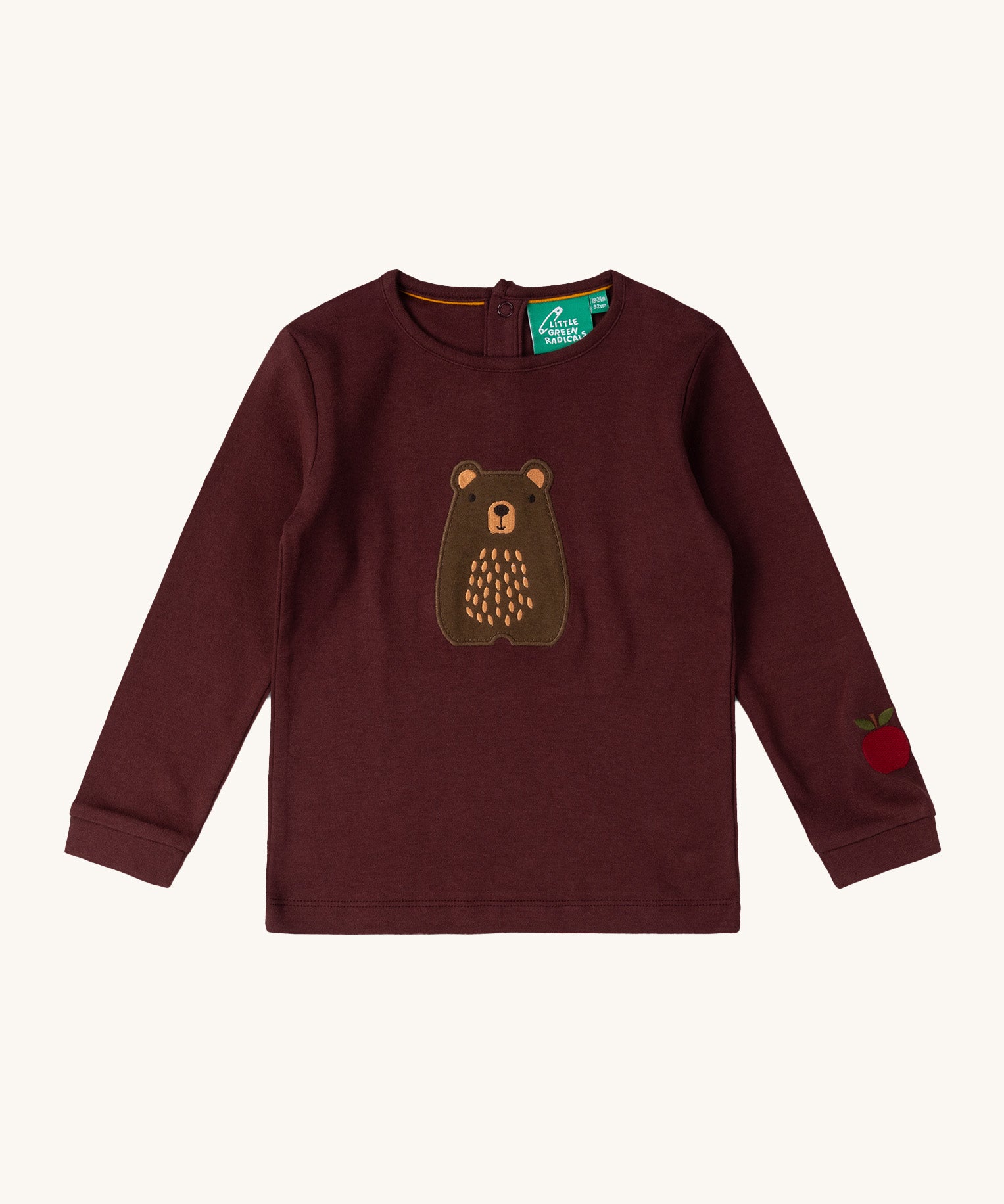 Little Green Radicals teddy bear applique long sleeve t shirt available at Babipur. A GOTS organic cotton long sleeve top in dark maroon with a cute brown bear appliqué on the front and apple on the arm 