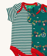 A close up of the A 2 pack of Little Green Radicals The Bear Jamboree Baby Body Set available at Babipur showing the red trim detail on both vests.