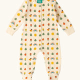 Little Green Radicals vintage style cream rainbows organic cotton babygrow. Repeat print featuring nature themed illustrations.