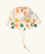 Little Green Radicals child's organic cotton reversible sunhat with a pink and yellow Flora print.