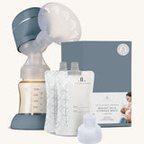 The Lola & Lykke Breast Pump Set, includes the Smart Electric Breast Pump, Milk storage bags and adapter. The box is also in the image next to the milk bags
