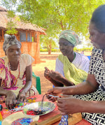 Artisan Refugees creating beautiful bracelets and jewelry 