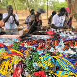 Sudanese Refugees creating bracelets and jewelry