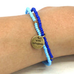 A closer look at the MADE51 Handmade #WithRefugees Bracelet, on a persons wrist