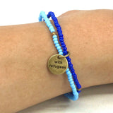 A closer look at the MADE51 Handmade #WithRefugees Bracelet, on a persons wrist