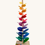 Magic Wood Giant Marble Tree Toy measuring 150cm, a wooden tall stem with rainbow leaves and glass marbles to create satisfying sounds.
