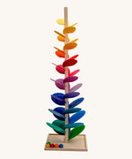 Magic Wood Giant Marble Tree Toy measuring 150cm, a wooden tall stem with rainbow leaves and glass marbles to create satisfying sounds.